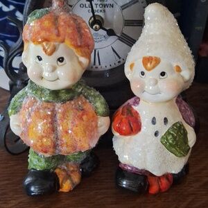 Vintage Porcelain Halloween Boy in Pumpkin and Girl in Ghost Costume Figurines